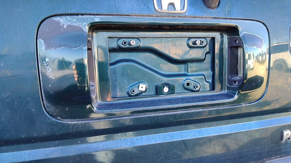 Honda Passport 2000 placa moldura panel envolvente fabricante original Hgm Huntsman verde Foto 1 de 4