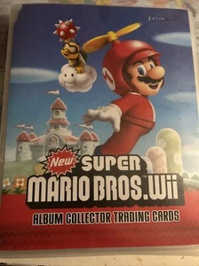 Super Mario Bros Wii Sammelheft + Karten - Bild 1 von 23