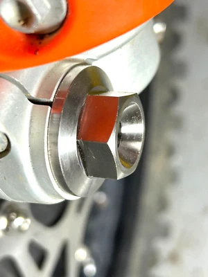 KTM 85 SX 2012-2025  FRONT AXLE SPINDLE BOLT TITANIUM FLANGEd No Rust - Image 1 of 4
