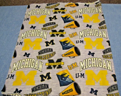 FABRIC REMNANT UNIVERSITY OF MICHIGAN  LOGOS  1/3 YDS. 42" W X 13" L CRAFT DECOR - Image 1 of 3