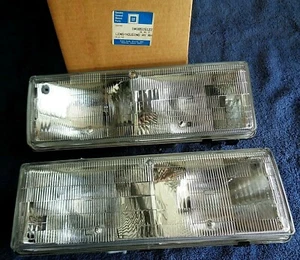 NOS NEW OEM GM 87-90 Caprice Classic RIGHT & LEFT Headlight Headlamp Light Lens - Picture 1 of 12