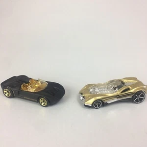 Hot Wheels Ford GTX1 Black & Gold - Cul8r Gold & Silver - Picture 1 of 12