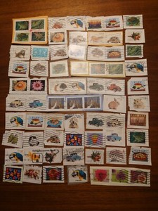 60G MEDIUM SIZE COMMEMORATIVE STAMPS - KILOWARE ON PAPER