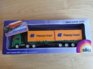 SIKU 3424 Iveco Turbostar Containers Hapag Lloyd / BOXED - Afbeelding 1 van 3