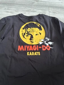 THE KARATE KID MENS BLACK SHORT SLEEVE T-SHIRT..SIZE SMALL..MIYAGI-DO KARATE - Picture 1 of 2