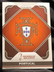 2022 PANINI PRIZM FIFA WORLD CUP QATAR #20 - PORTUGAL TEAM BADGE - SILVER PRIZM - Picture 1 of 2