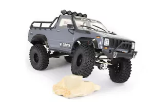 Camión grúa pick Up Trail FTX 1:10 Outback Hi-Rock 4x4 radiocontrol RTR - Imagen 1 de 12