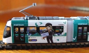 Tomytec N gauge TLR0605 Toyama Portram tram anime conductors dark green doors - Picture 1 of 8