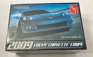 2009 Chevy Corvette Coupe 1:25 Plastic Model Kit SEALED Showroom Replicas AMT - Picture 1 of 6