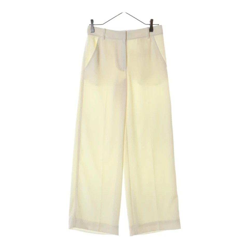 T by ALEXANDER WANG Camiseta Prensa Central Pantalones Anchos Poliéster Blanco Usado baf70ac178 Foto 1 de 4