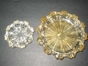 Juego vintage de 2 ceniceros redondos de cristal ámbar y transparente - Imagen 1 de 3