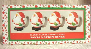 NIB Porcelain SANTA CLAUS NAPKIN RINGS Set of Four - Picture 1 of 5