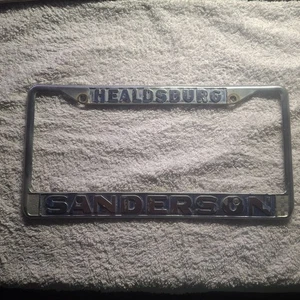 RARE VINTAGE FORD-MERCURY SANDERSON HEALDSBURG CA. CAR LICENSE PLATE FRAME PART - Picture 1 of 5