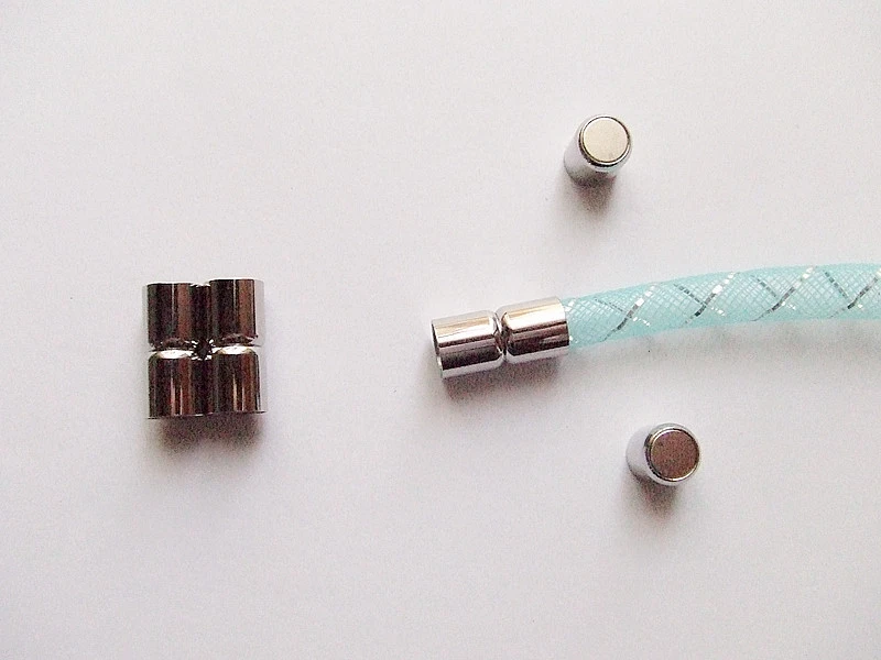 1set chiusure magnetiche calamita in acciaio inox 19x9mm  colore argento  scuro - Immagine 1 di 1