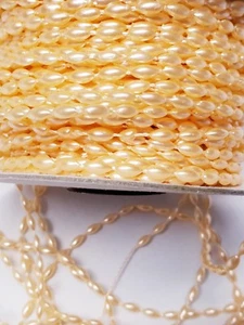 Peach Rice Bead String Trim 3mm x 6mm size bead per 1m cut to order. - Picture 1 of 3