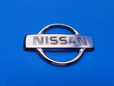 99 00 01 NISSAN XTERRA REAR GATE CHROME EMBLEM LOGO BADGE SYMBOL USED OEM A16 - Image 1 of 3