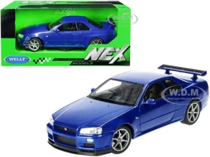 NISSAN SKYLINE GT-R (R34) RHD BLUE 1/24 DIECAST MODEL CAR BY WELLY 24108 - Picture 1 of 3