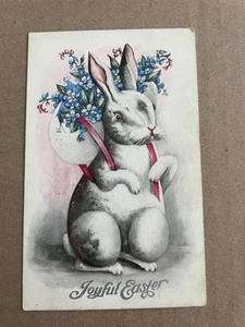 Vintage POSTCARD 1910 Easter Bunny Rabbit Egg backpack Flowers anthropomorphic - Picture 1 of 2