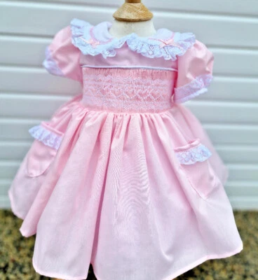 DREAM BABY WEAR UK Baby girls 0-7 years pink hearts smocked embroidered traditional netted dress