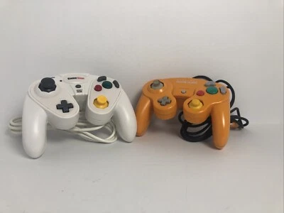 Lot of 2  Gamecube controllers 1 Orange GameCube & 1 White GameStop Controller - Image 1 of 4
