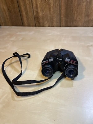 VINTAGE TASCO ZIP FOCUS 7X25  BINOCULARS FULLY COATED OPTICS 376 FT/1000 YDS - Image 1 of 4