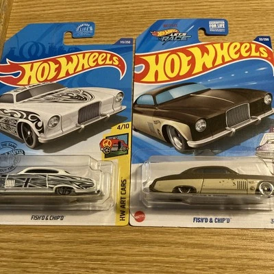 HOT WHEELS 2020 113 WHITE & 2025 #32 TREASURE HUN TH FISHD & CHIPD JAGUAR ERRORS - Image 1 of 4