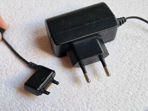 Original Sony Ericsson Handy Ladekabel Netzteil CAA-0002005-BV - schwarz - Bild 1 von 7