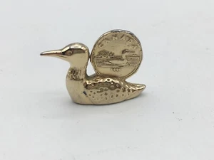 Biglietto lotteria canadese tiragraffi Canadian Loonie montato sul retro di un loon - Foto 1 di 10
