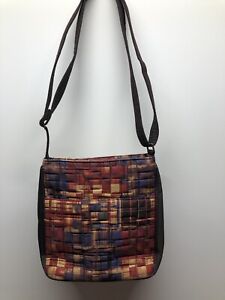 Donna Sharp brand purse. This is a brown with a plain design