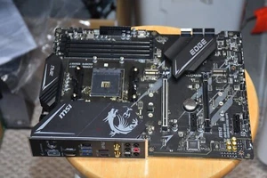 Carte mère MSI MPG B550 GAMING EDGE WIFI AM4 AMD B550 Wi-Fi 6 ATX - Photo 1/2