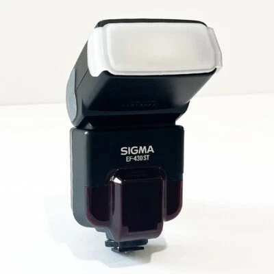 Flash electrónico estroboscópico Speedlite SIGMA EF-430 ST para cámaras SLR - apenas usado Foto 1 de 4
