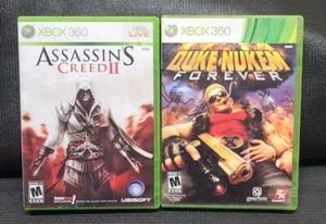 Lot of 2 Xbox 360 Games - Duke Nukem Forever & Assassin's Creed 2 - Picture 1 of 4