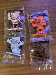 KAWS General Mills Monstruos Figuras Conjunto De 4 Juguetes En Mano! ¡NUEVO PRECINTADO! Trusted - Imagen 1 de 9
