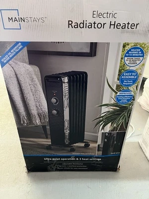 Mainstays WSH07O2ABB 1500W Mechanical Oil Filled Electric Radiator Heater, Black - Image 1 of 4