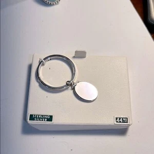 Sterling Silver Keychain with Oval 7/8” Tag Some Scratching on Back Never Used - Picture 1 of 12