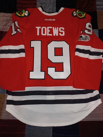 2016-17 Chicago Blackhawks Jonathan Toews Reebok 2.0 Pro Jersey 52 Fight Strap Cover