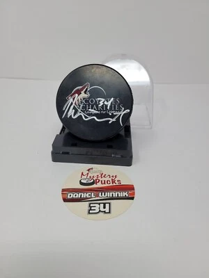 Daniel Winnik #34 Signed Autographed Hockey Puck Phoenix Coyotes NHL - Image 1 of 4