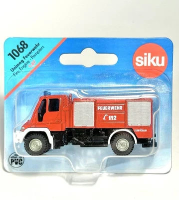 Camión de bomberos Siku 1068 Unimog modelo fundido a presión, como nuevo Foto 1 de 2