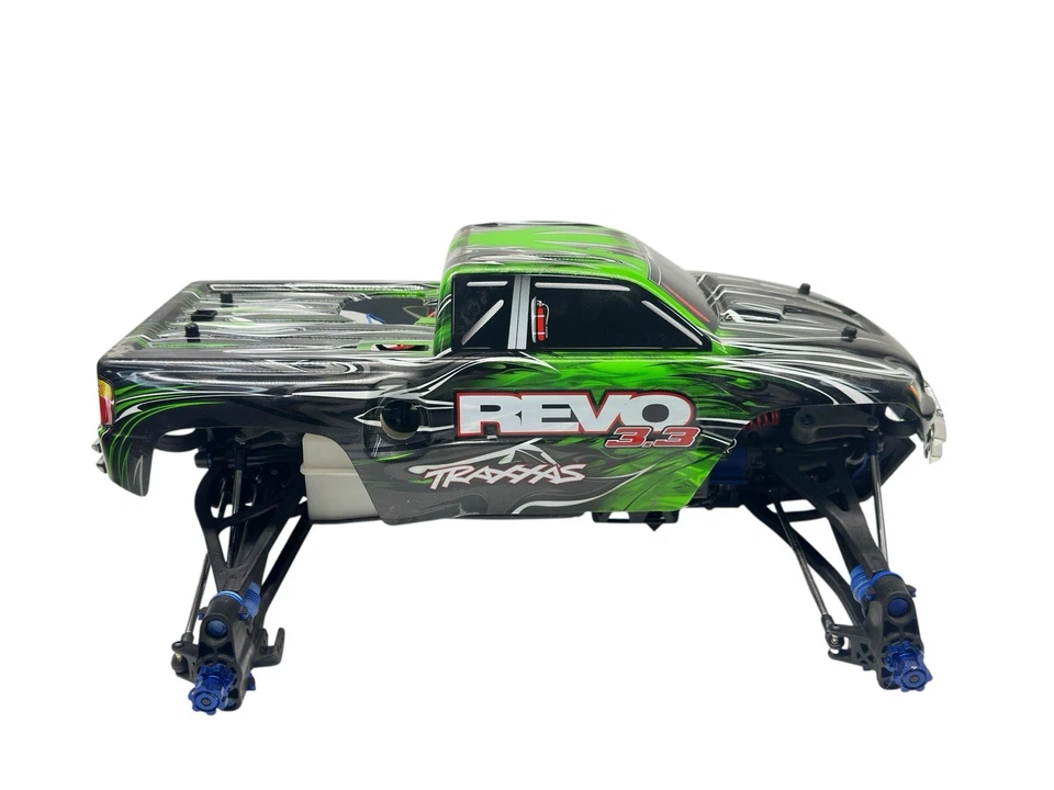 Traxxas Revo 3.3 4WD 1/10 Scale Monster Truck Slider/Roller W Body #16466 - Image 1 of 4