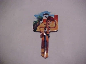 Disney Woody nuova chiave di casa vuota non tagliata LW 4 spedizione gratuita - Foto 1 di 2