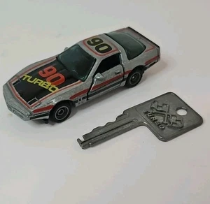 Kidco Lock Ups Chevy Corvette Turbo silber 1:64 1982 Diecast mit Schlüssel - Bild 1 von 8