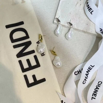 Aretes colgantes barrocos de perlas de agua dulce para mujer  Foto 1 de 4