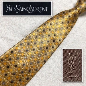 Excellent condition Yves Saint Laurent tie with metal circle decoration all over - Picture 1 of 10