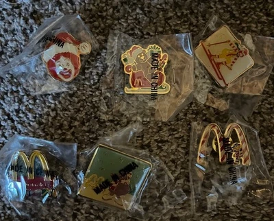 6 McDonald’s Holiday Winter Employee Lapel Hat Pins Ronald Skiing Grimace Snow - Image 1 of 4