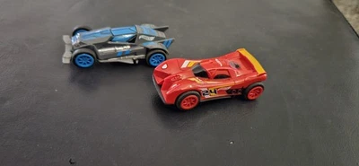 1/43 HOTWHEELS !!! TWO CARS  WILL RUN ON CARRERA TRACKS CHECK OUT THE PIX  - image 1 of 4
