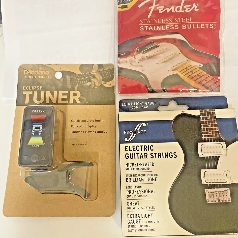 SINTONIZADOR DE GUITARRA CLIP D'ADDARIO + DOS JUEGOS DE CUERDAS DE GUITARRA ELÉCTRICA GUARDABARROS Foto 1 de 4