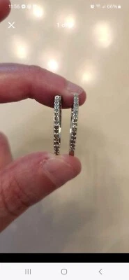 Pendientes de aro de diamantes de 0,5 quilates Foto 1 de 3
