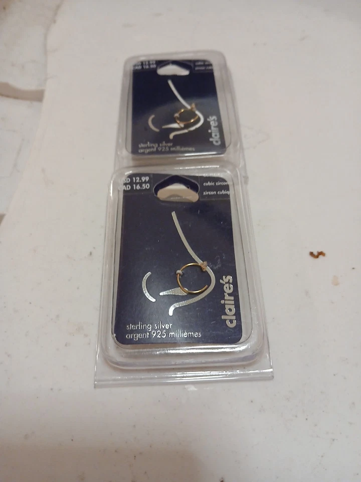 Lote de (2) joyas nariz de Claire. Plata de ley 22 g/0,6 mm circonita cúbica 0,925 precio de venta sugerido por el fabricante 26 USD nuevo con etiquetas Foto 1 de 2