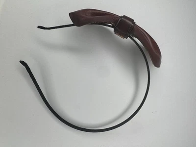 Diadema con lazo de cuero marrón - Diseño minimalista esculpido Foto 1 de 3