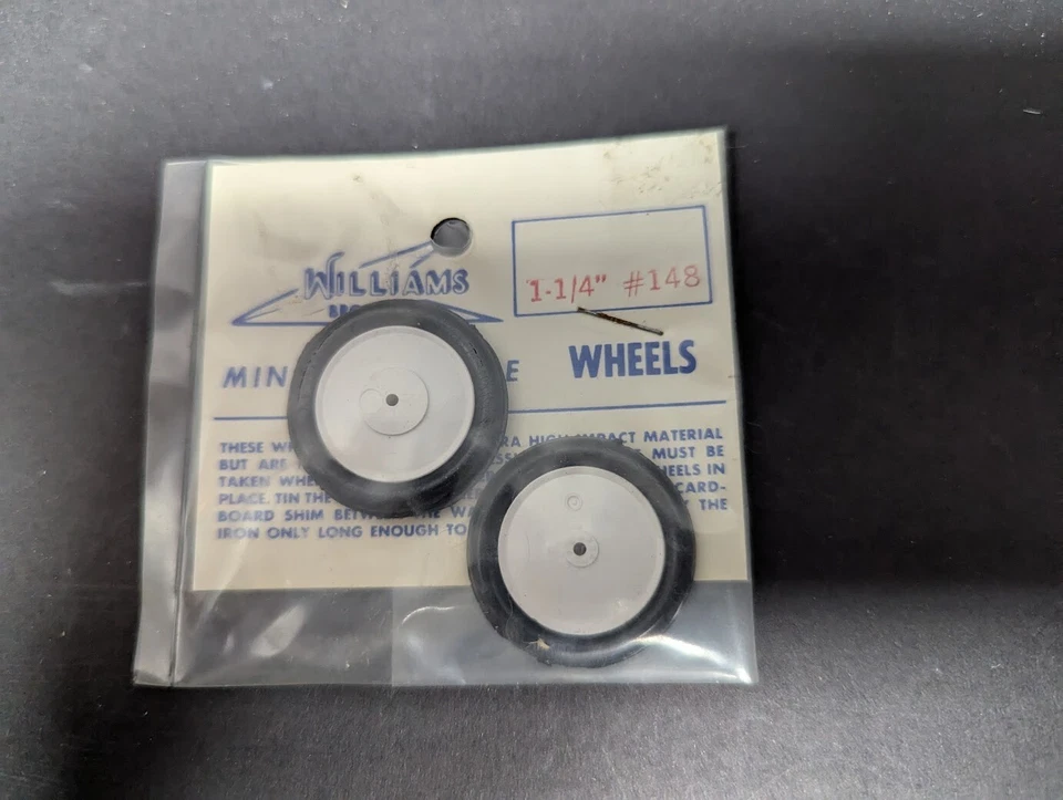 VINTAGE WILLIAMS BROS MINIATURE SCALE 1-1/4" WHEELS #148 WHITE RC AIRPLANE *NOS* - Image 1 of 2